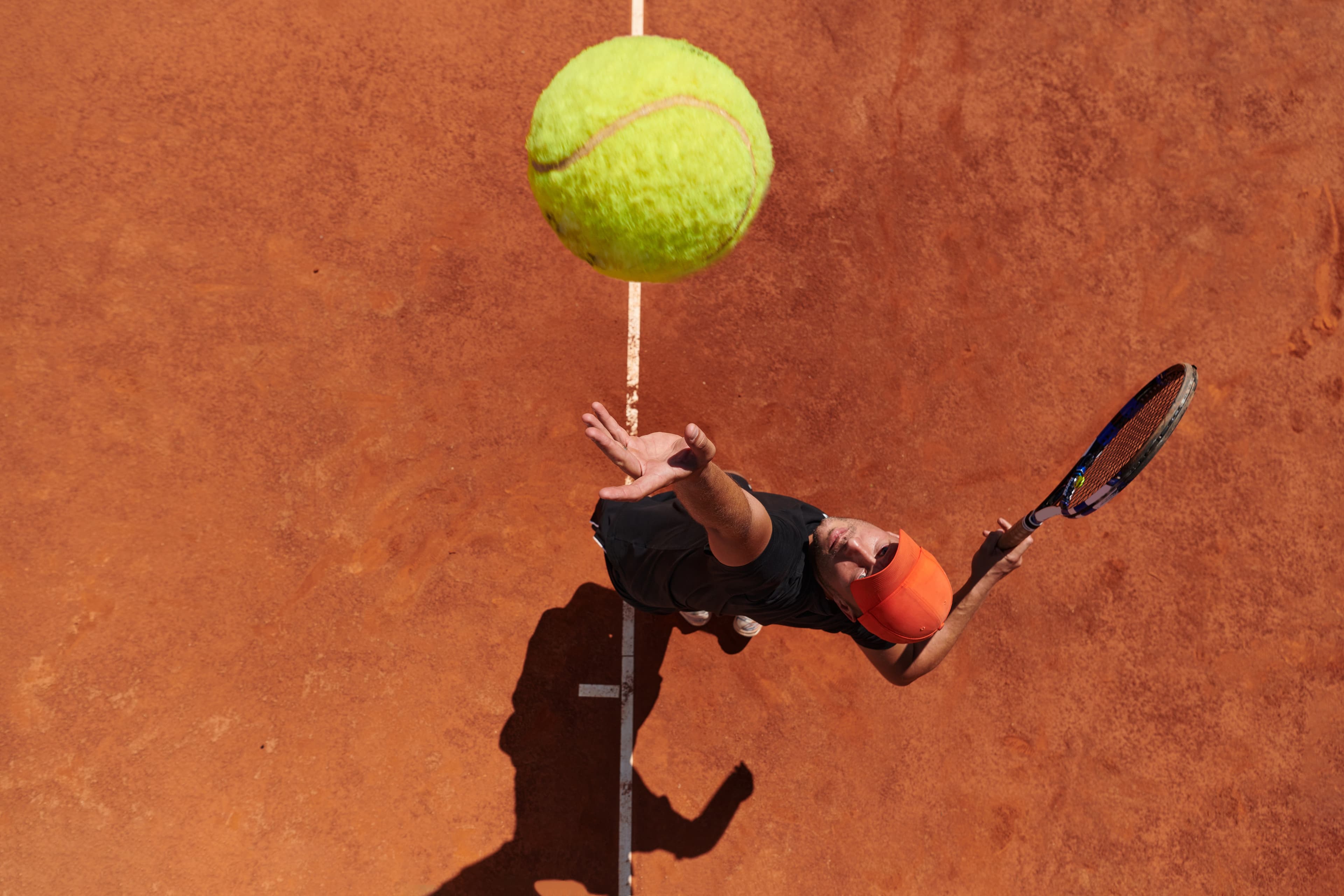 Service tennis terre battue